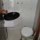 Cabinet de toilettes avec douchettes eau chaude