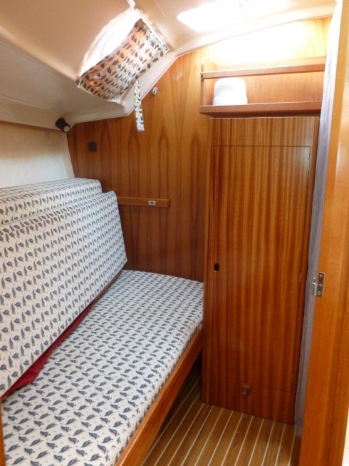 Double cabin convertible in sofa with door and bulkhead